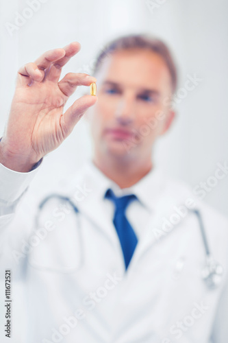doctor with pill in hospital