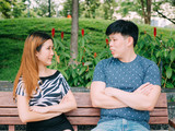 Asian couple having disgreement - love and relationship conflict