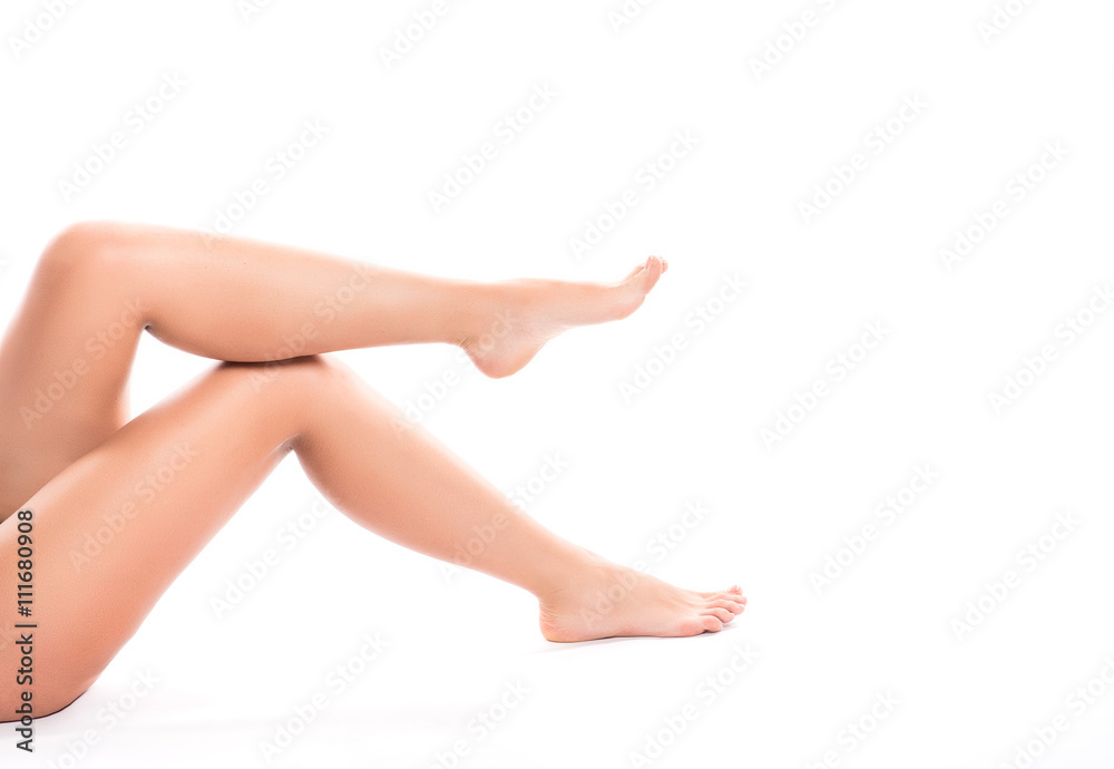Slim long sexy woman legs on white background. Slim long sexy woman legs on white background.
