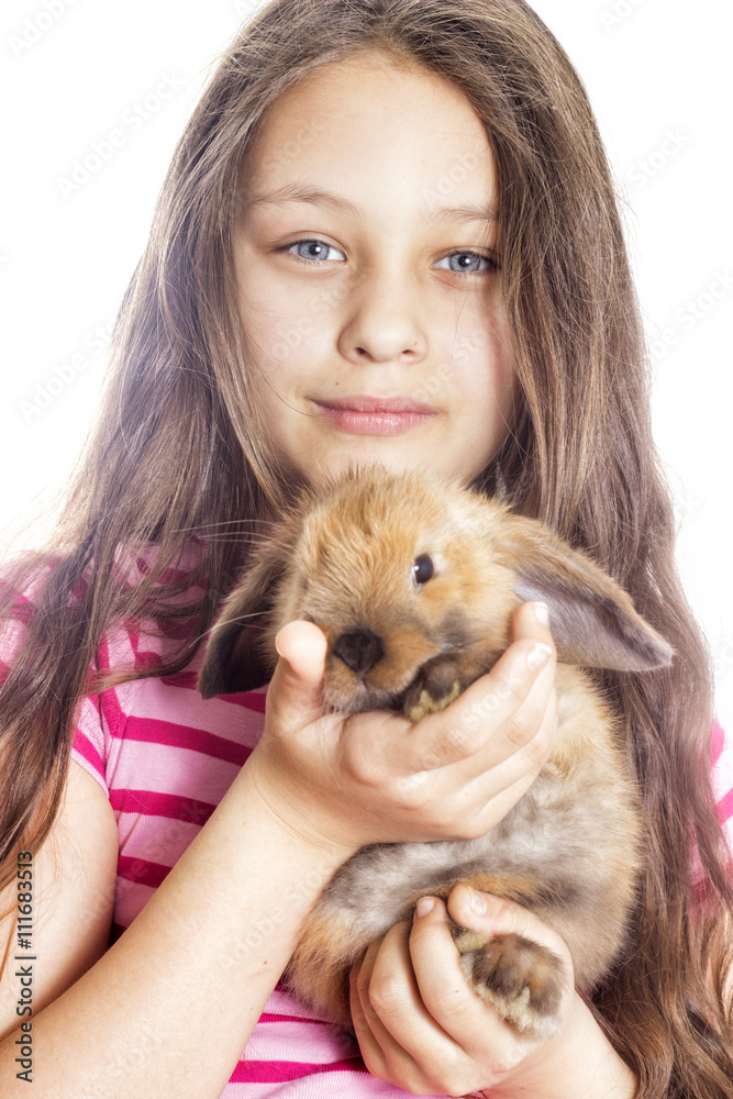 Obraz premium Girl embracing rabbit