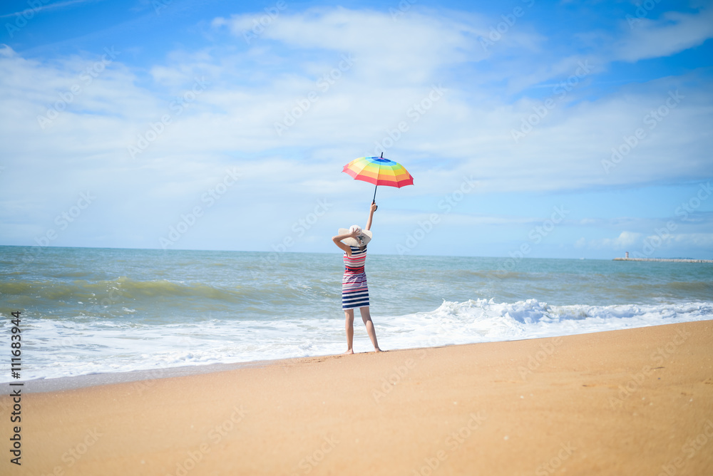 Excited romantic female having fun on beach walk on sunny outdoors background Excited romantic female having fun on beach walk on sunny outdoors background