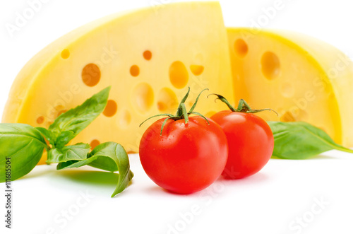 Cheese and basil with tomatoes leaves still life