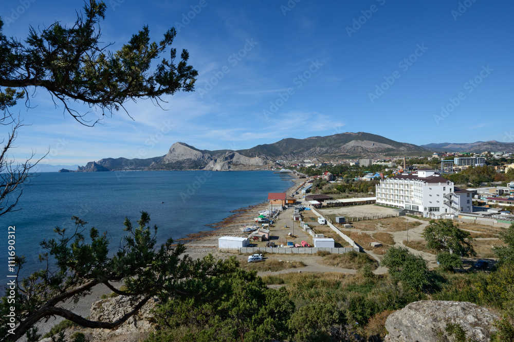 View along Sudak beach from Alchak Cape, Crimea, Russia.