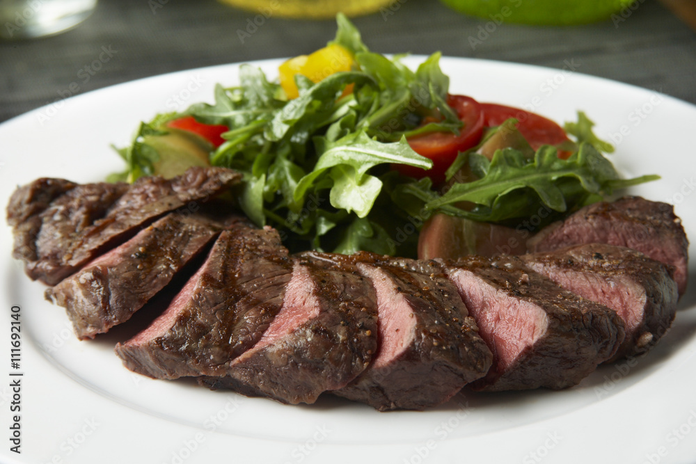 wood grilled layered beef loin with salad wood grilled layered beef loin with salad