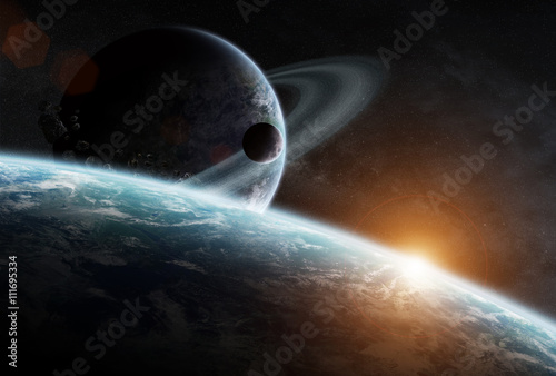 Fototapeta Naklejka Na Ścianę i Meble -  Sunrise over group of planets in space