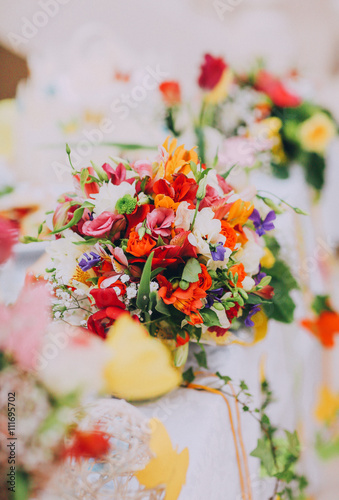 stylish luxury decorated table with flowers and delicious food, celebration wedding, catering in the restaurant