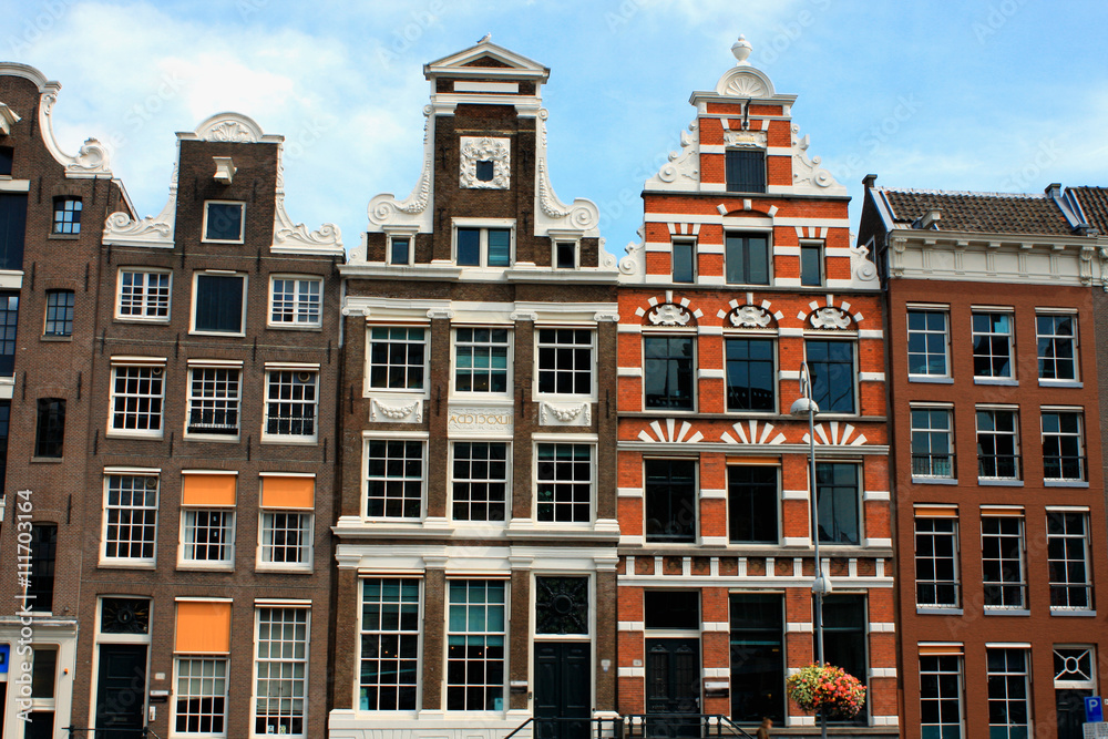 landmark of sloping houses in Amsterdam city.