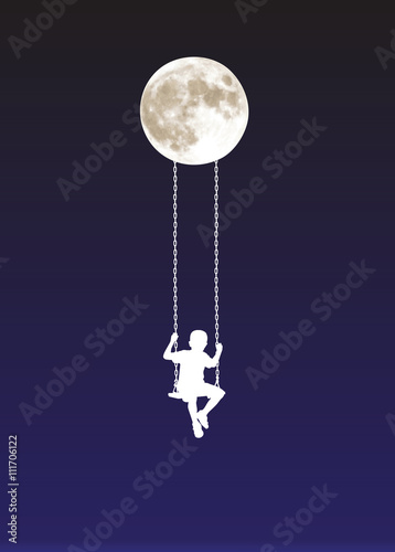 boy on a swing at moonlight