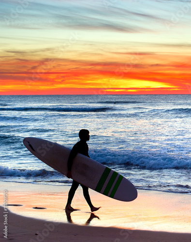 Surfer at sunset