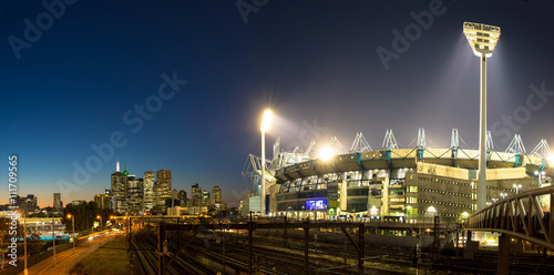 The Melbourne skyline  and the Melbourne Cricket Ground at sunse