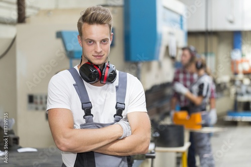 Tablou pe pânză Portrait of young man metallurgist
