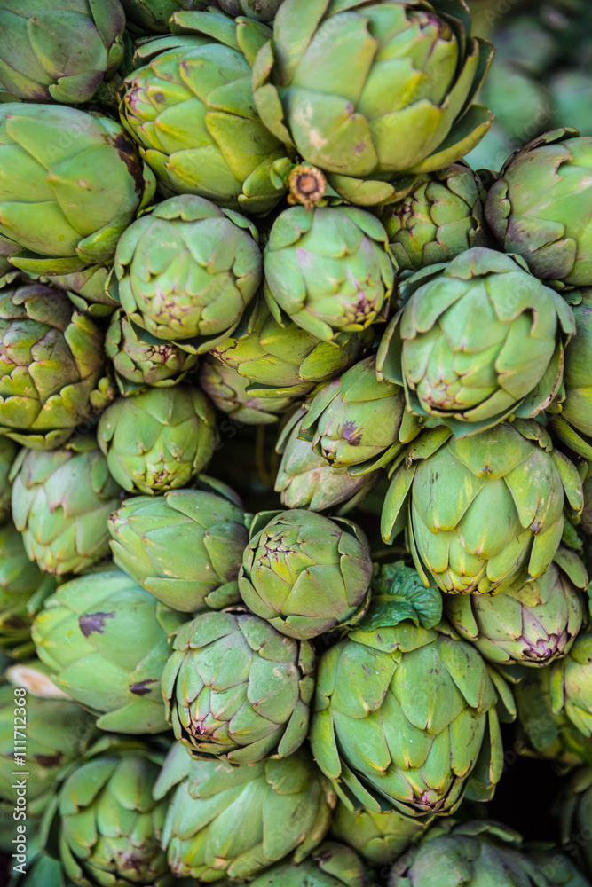 Fototapeta premium Background of fresh artichokes