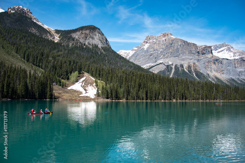 Canda, Rocky Mountains, Yoho Natational Park: view on the Emerald Lake with a Kayaking Family 