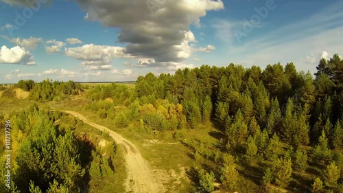Rural road in steppe in summer day