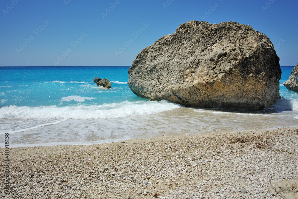 Blue Waters of Megali Petra Beach, Lefkada, Ionian Islands, Greece Blue Waters of Megali Petra Beach, Lefkada, Ionian Islands, Greece