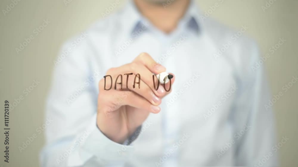 Data Volume, Man writing on transparent screen Data Volume, Man writing on transparent screen