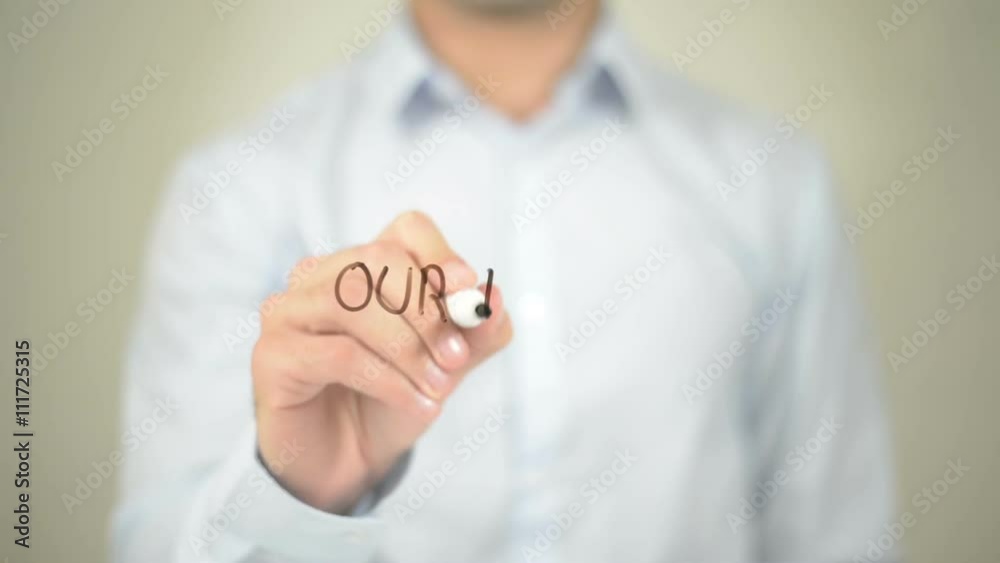 Our Team , Man writing on transparent screen Our Team , Man writing on transparent screen