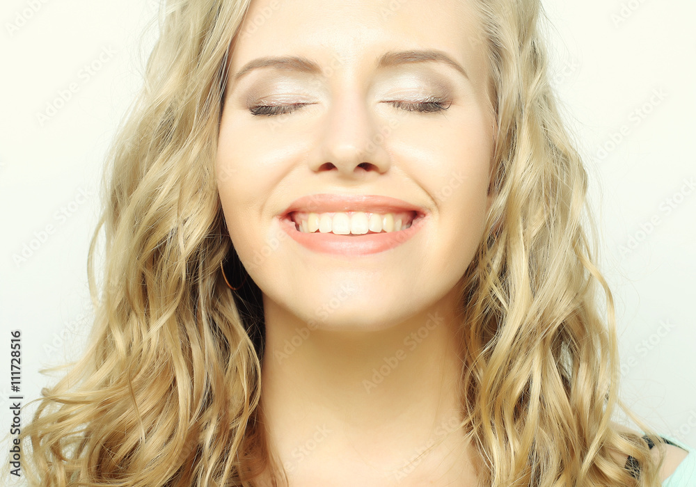 blond girl smiling and laughing blond girl smiling and laughing