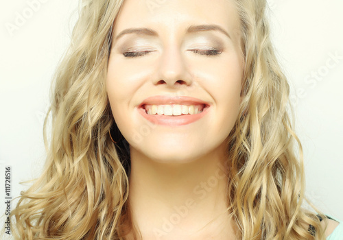 blond girl smiling and laughing