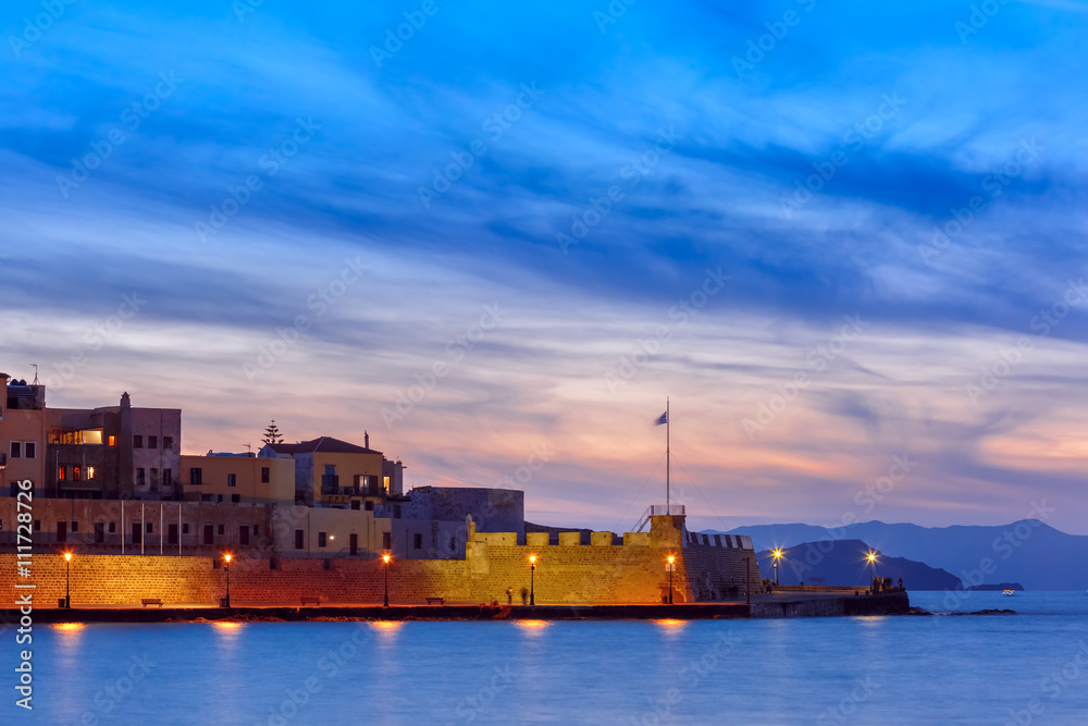 Famouse venetian harbour waterfront of Chania at sunset, Crete, Greece