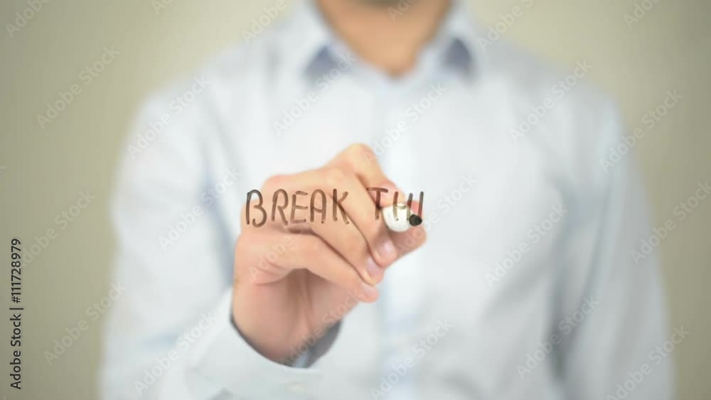 Break Through, Man writing on transparent screen Break Through, Man writing on transparent screen