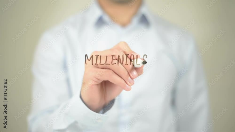 Millenials Marketing , Man writing on transparent screen Millenials Marketing , Man writing on transparent screen