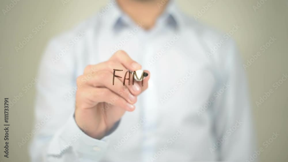 Family , Man writing on transparent screen Family , Man writing on transparent screen