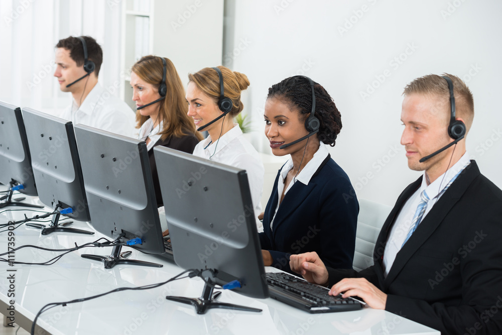Businesspeople Working In Call Center Businesspeople Working In Call Center