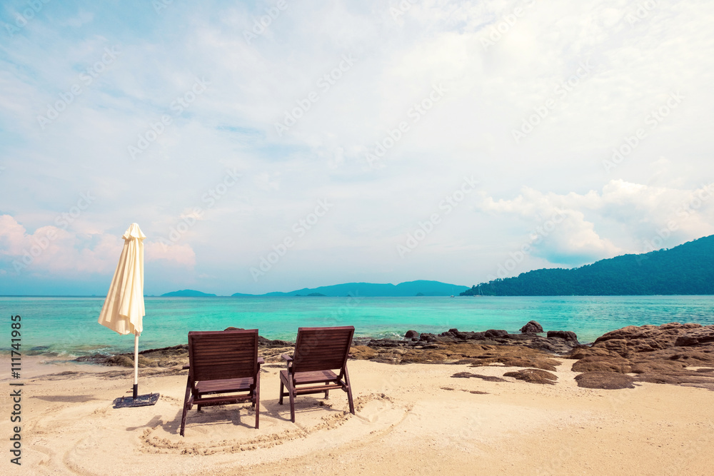 The beach with two chairs. Beach vacation. Beach holiday