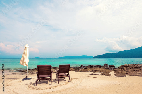 The beach with two chairs. Beach vacation. Beach holiday