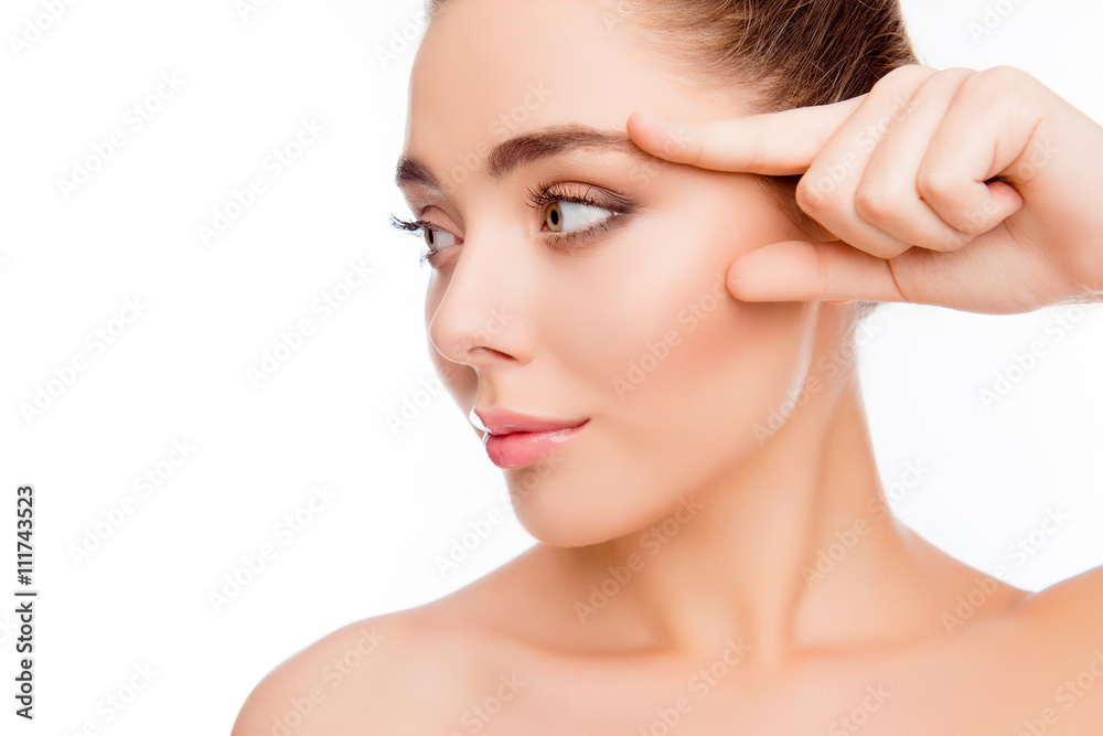 Pretty young woman after shower pointing with finger