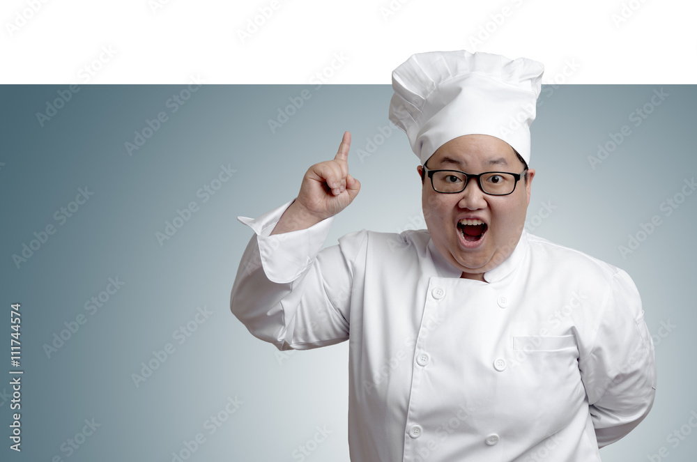 Asian chef point above on plain radius background Asian chef point above on plain radius background