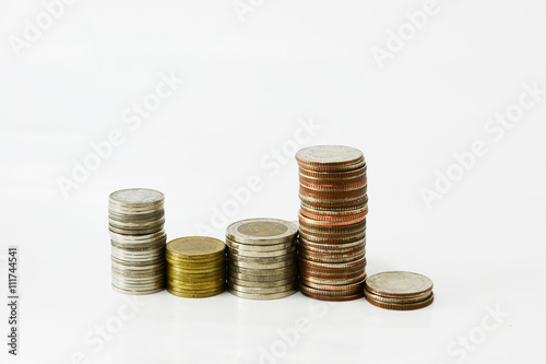 bundle of money and pile of coin