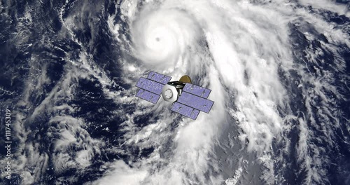Top view of Earth-observing CloudSat spacecraft in orbit above a major hurricane. Data: NASA/JPL. photo