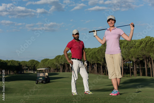 portrait of couple on golf course