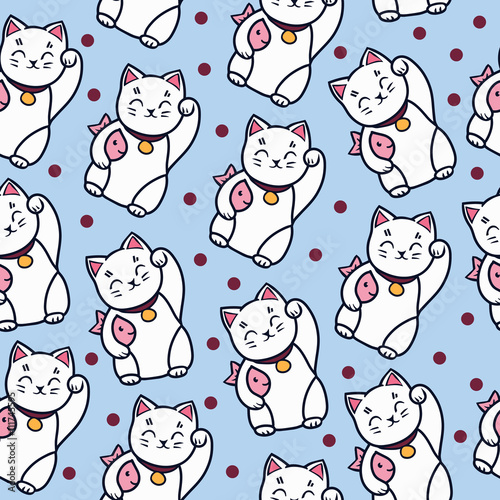 Maneki neko cat with fish seamless pattern.