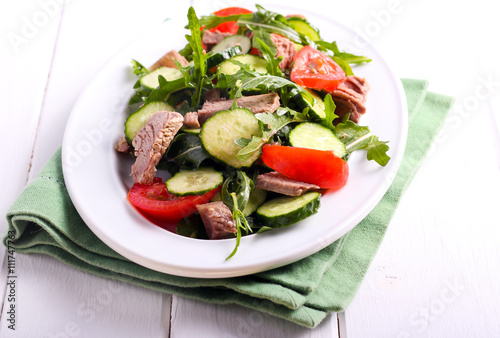 Beef, cucumber, tomato and rocket salad