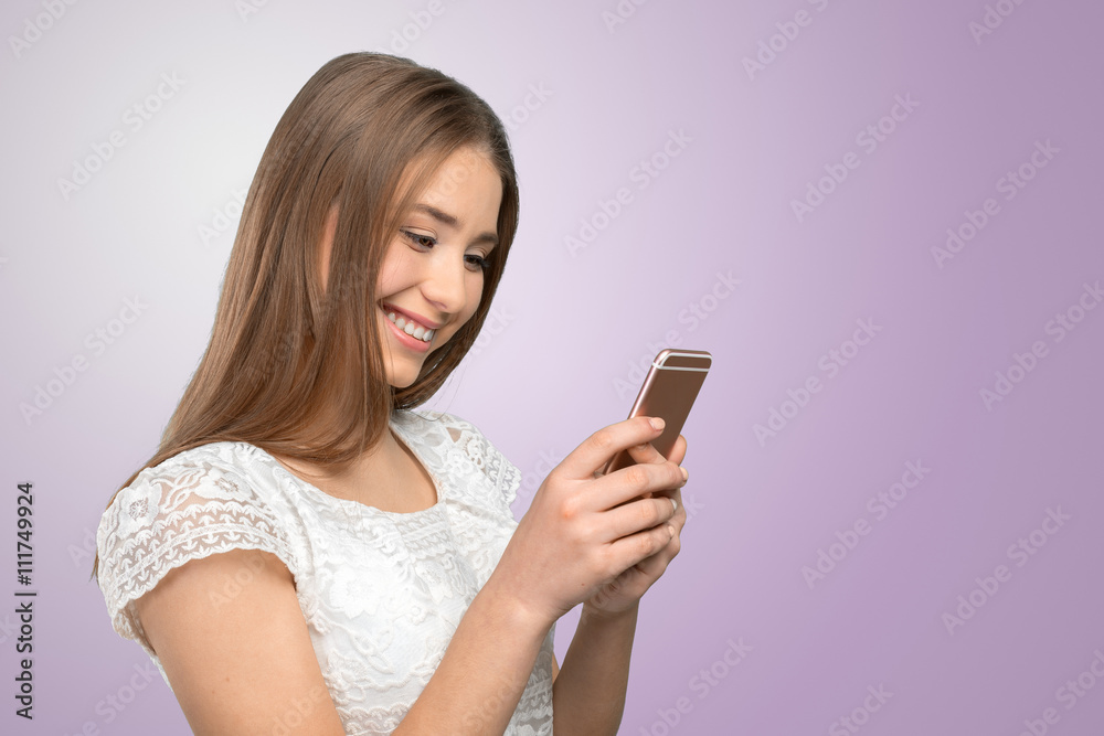 Beautiful woman texting on her cell phone Beautiful woman texting on her cell phone