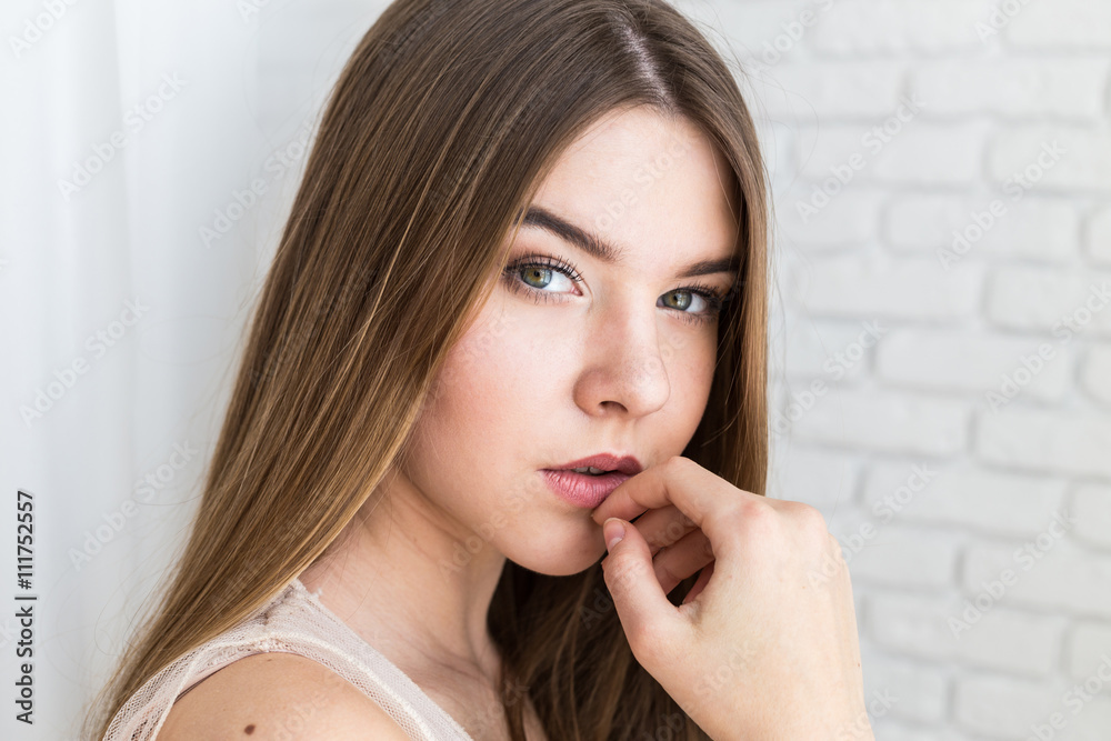 Fototapeta premium Beautiful woman face close up studio