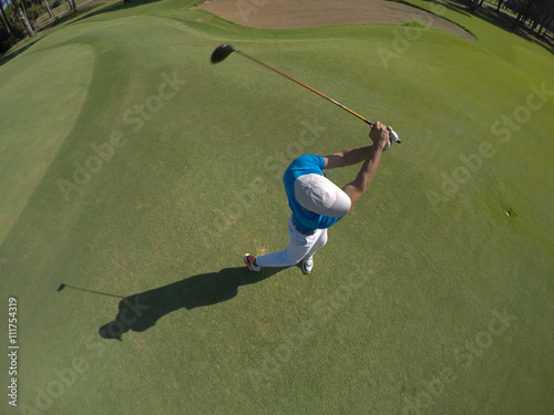 top view of golf player hitting shot