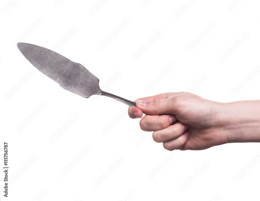 Fototapeta premium kitchen utensils in the hand of women isolated on white background