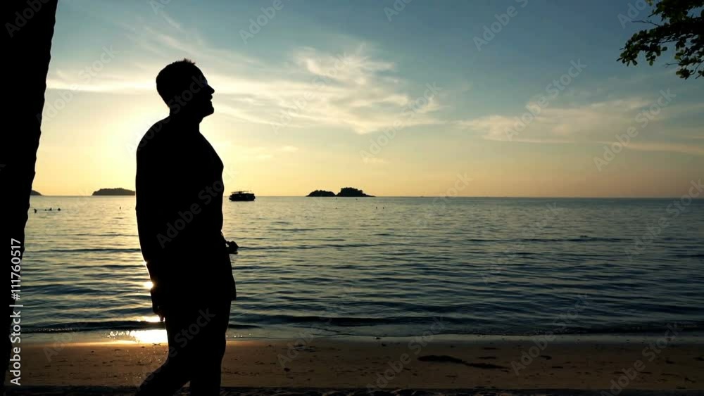 Handsome man walking on the beach during sunset, shot at 240fps
Handsome man walking on the beach during sunset, shot at 240fps