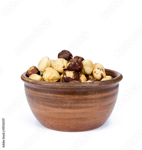 Almonds in a bowl isolated