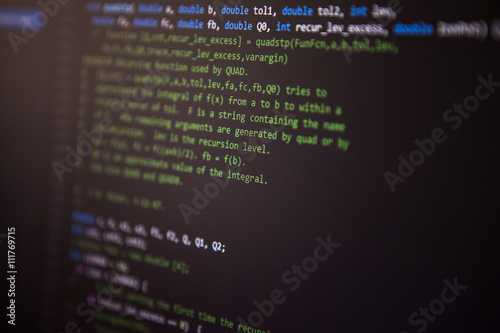 programming code on the screen. Perspective. Shallow depth of fi