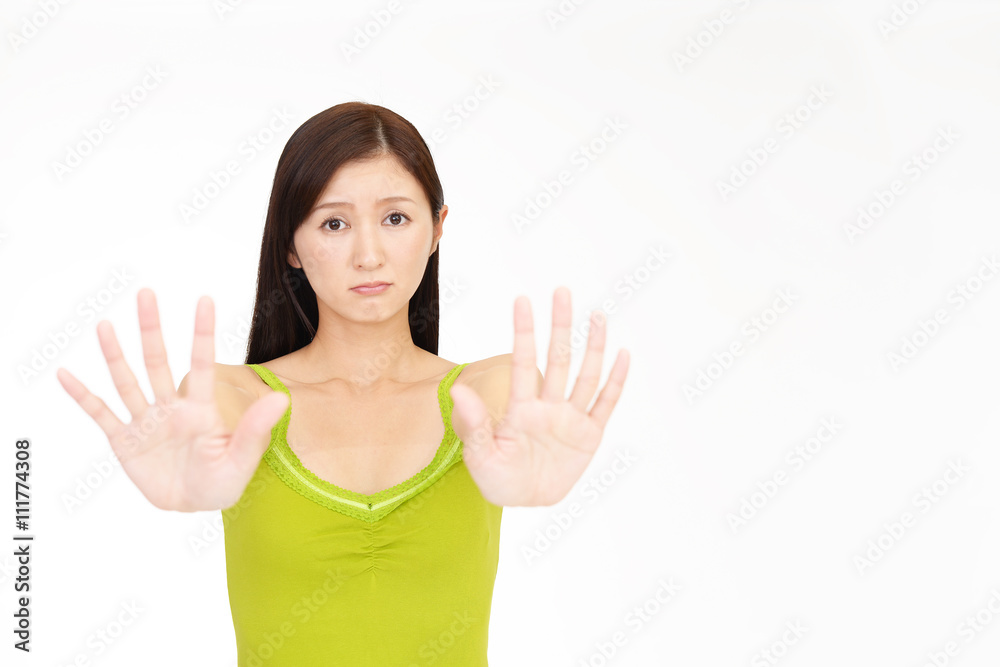 ストップのジェスチャーをする女性 ストップのジェスチャーをする女性