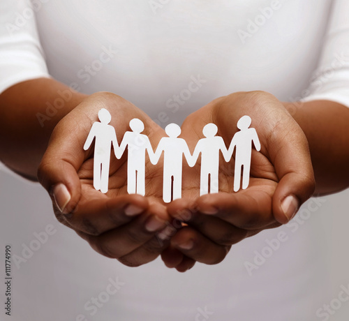 african american female hands with paper people