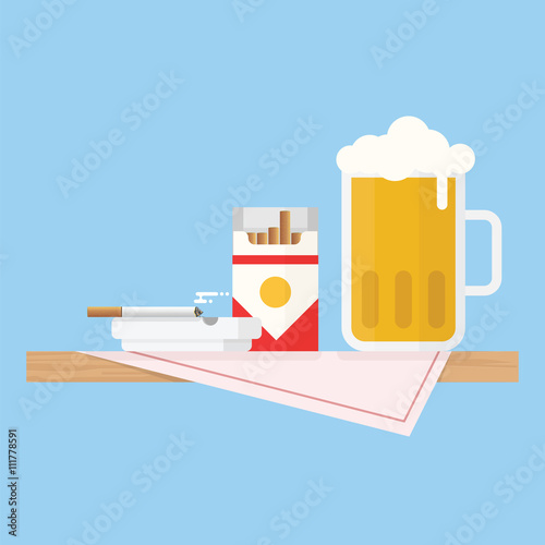 Wooden table with table cloth and beer