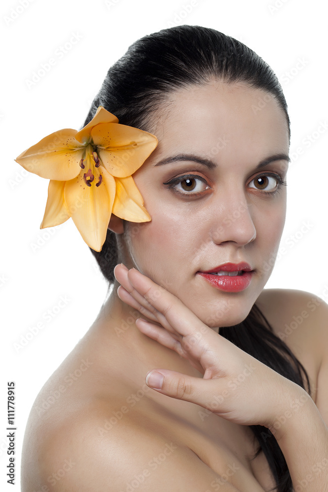 Fototapeta premium beautiful woman with flower on her ear