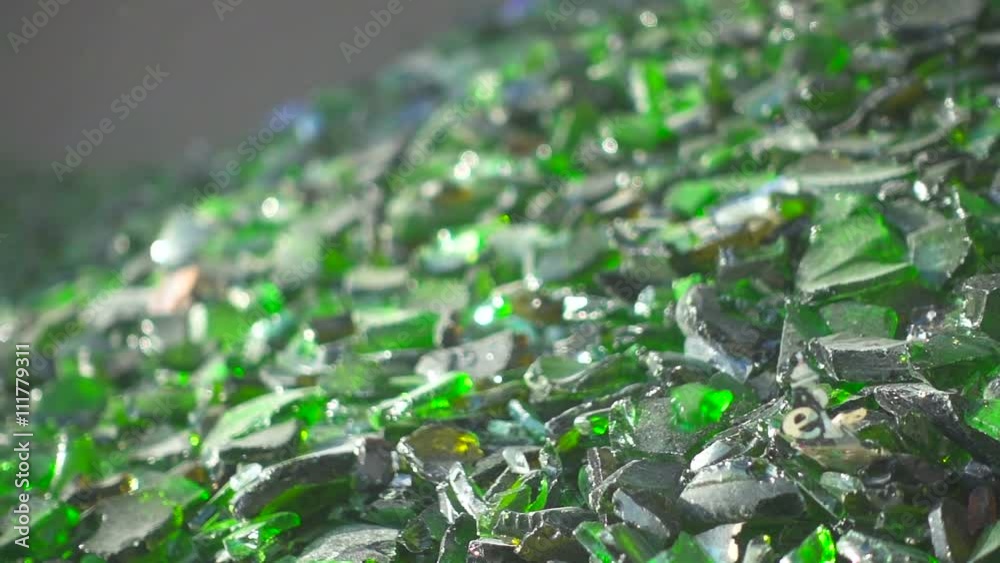 Sorting cullet. Glass recicling. Renewable production. Super slow motion