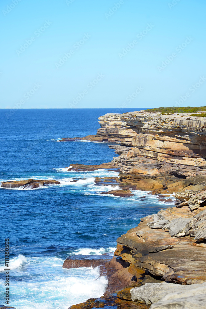 Rugged, rocky sandstone cliffs on the New South Wales coast, Australia